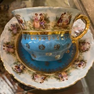 Antique teacups Love Story cup and saucer set.